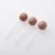 Import 15g ball shaped milky tea flavor sweets lollipop candy pin pop lollipops from China