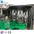 750ml Glass Bottle Automatic Vodka Alcohol Wine Carbonated Drink Filling Bottling Machine with Aluminum Screw Cap