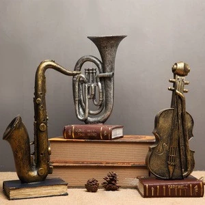 Antique Statue Saxophone Guitar Trumpet Sculpture Musical Instruments Orchestra Finishings Resin Sculpture Figurine Craft