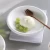Import Chinese ceramic hand-made flat plate tableware with shallow bottom; white Western food plate can be customized with 7-inch disc from China