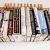 Import Custom made wooden book rack / bookshelf in Oak. The pins are also bookmarks. from China