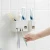 Import New Product Ideas Eco Friendly Automatic Toothpaste Squeezer Dispenser Bathroom Wall Mount Toothbrush Holder Storage Rack from China