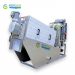 Sludge dewatering screw press for industrial wastewater treatment plant