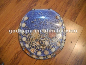 Transparent sea shell polyresin toilet seat cover in resin
