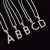 Import Vintage Alphabet Iced Out Tennis Necklace Zircon Diamond Initial Letters Pendant Initial Necklace from China