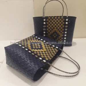 Vintage design dark blue plastic bag with yellow knit detail
