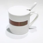 Wholesale Customize label Logo Metal black shiny ceramic coffee mug with ceramic lid and Stainless steel spoon