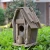 Import Wooden large outdoor bird nest  bird cage drift wood indoor bird house garden decoration from China