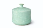 Round garnet-shaped ceramic vase