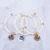 Import 2020 New hot fashion new trend  inspiration be brave cross  pearl elastic bracelet jewelry for women from China