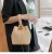 Import 2021 summer korea style hot sell women lady hand bag chain fashion plain colour bucket bag straw basket bag weaving from China