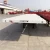 Import 3-Axles 40 FT 20 FT 40 Tons Shipping  Container Flat Bed Truck Semi Trailer from China