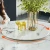 Import European modern luxury white round marble top stainless steel base dining table dining room set dining room furniture from China