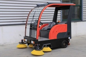 Fully enclosed electric ride on road sweeper