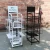 Heavy duty movable umbrella stand with wheels for store umbrella display rack