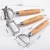 Import kitchen accessories tools Kitchen gadgetwooden handle stainless steel peeler set from China