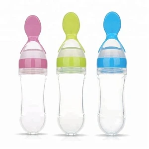 Manufacturing Hot Selling BPA Free 90 ml Baby Feeding Bottle Squeeze Silicone Food Feeder With Spoon Rice Cereal