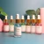 Import Private label empty bottle pen bulk packaging gallon nail care oil cuticle remover liquid softener mini cuticle oil with flowers from China