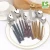 Import tableware guangzhou home goods dinnerware dinner set dining table set wooden handle stainless steel dinnerware sets from China
