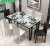 Import 6 Seats Simple Set Modern Glass Dining Table from China