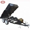 Black dump steel box trailer with electric brakes and loading ramps
