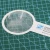 Import Custom PVC material AM817 140*70mm hand hold magnifier glass for reading from China