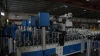 Door casing and frame profile wrapping machine with PUR hotmelt
