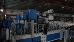 Door casing and frame profile wrapping machine with PUR hotmelt