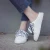 Import HLS152 new fashion women canvas flat shoes women casual walking shoes with lace-up from China