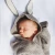 Import Ins hot sale crochet knitting pattern baby blanket rabbit ear baby sleeping bag from China