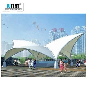 Jutent membrane steel tensioned fabric hotel tent pool shade structures architecture tensile structure