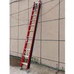 Non self-supporting telescopic extendable ladder without platforms suitable for use on overhead power lines