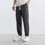 oem custom logo design cool little straight nine-point pants for men made of lyocell tencel cotton leg-tie casual sports pants