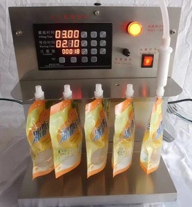 Table top spout pouch filling capping machine