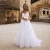 Import Lace Boho Wedding Dresses Open back spaghetti straps white lawn wedding dress Wedding Gowns Beach Bride Dress Vestido De Noiva from China