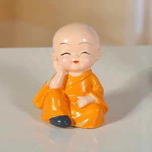 Chinese factory wholesale four pieces set  litter  monk resin crafts statue for car table decoration