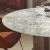 Import Home furniture minimalist dining room table 6 chairs stainless steel sintered stone round dining table from China
