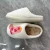 Import Home winter warm Plush anti slip smiling face boots printed cotton embroidery slide slippers from China