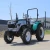 Import in Stock High-Quality 25HP Wheel Tractor with 4 Attachments Mini Tractor from China