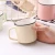 Import pink blue beige green ceramic enamel speckled coffee mug campfire mug from China