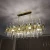 Import Rectangle Shape Modern Transparent Crystal Glass Rod Ceiling Lamp Chandelier from China