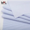shirting stocklot blue fabric twill yarn dyed 60% cotton 20% polyester 20% tencel twill fabric