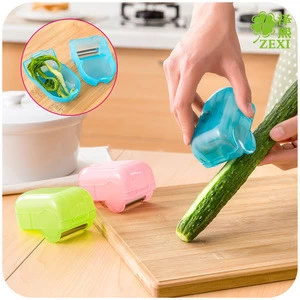 Vegetable Peeler - Best Catch All Container with Good Sturdy Grips Kitchen Gadget for No Mess Peeling, Empty Container and Peel
