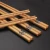 Import 2 pair Bamboo Chopsticks Handmade Japanese Natural Chestnut Wood Chopsticks Set Value Gift Sushi Chinese food Tie line Tableware from China