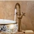 Import Antique Brass Deck Mounted Bathroom Sink Mixer Tap Dual Handle Washbasin Faucets from China