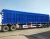 Import CIMC HUAJUN 3axles enclosed box semi trailer 13m cargo truck  van semi trailer from China