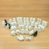 Custom unique  New arrival  FACTORY OUTLET OEM animal shaped white ceramic spice  salt and pepper shakers set