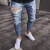 Import Custom wholesale new style fashion high quality blue slim fit ripped hole denim jeans men from China