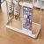Import Desktop metal two-layer mobile phone jewelry glasses display stand holder from China