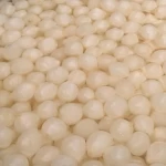 Fermented small onions. Healthy preserved vegetables. Superfoods. Wholesale brined onion prices.